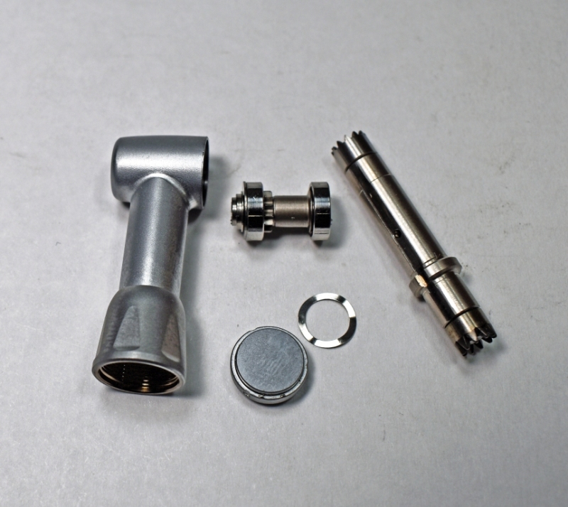 Disassembled latch head with shaft.